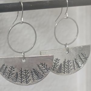 Five sets of designer earrings